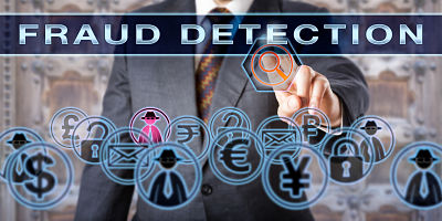 Civil or criminal investigator is touching the words FRAUD DETECTION on a transparent control screen. Forensic science and law enforcement concept. Cyber crime and deception metaphor.